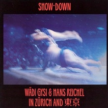 Show-Down In Zürich And Tokyo